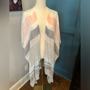 White, pink, light blue and navy blue wrap blouse or bathing suit cover up